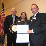 Presenting the Greater East Dallas Chamber of Commerce Pete Sessions Award to Darlene Ellison are Sessions (left) and Chamber chairman Roger Perry.