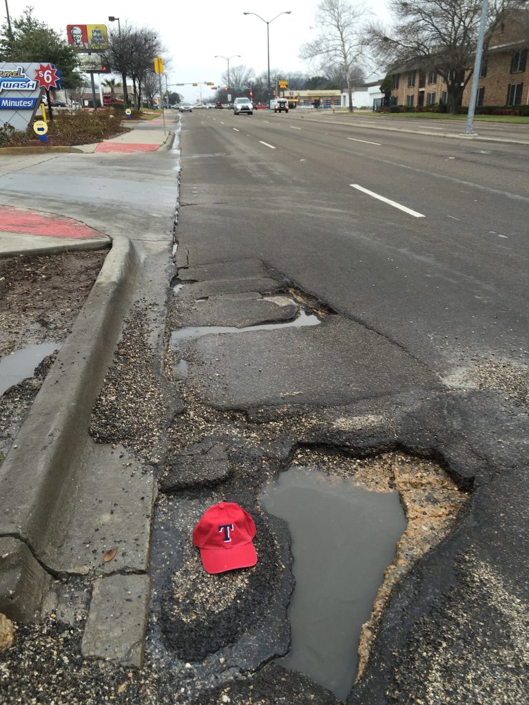 Watch out for the $197 pothole eastbound on Mockingbird east of Skillman.