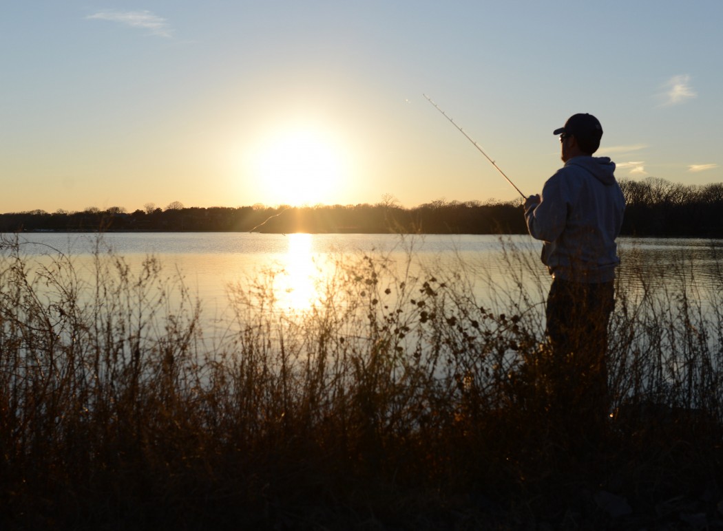 Fishing at White Rock Lake: Advocate stock photo