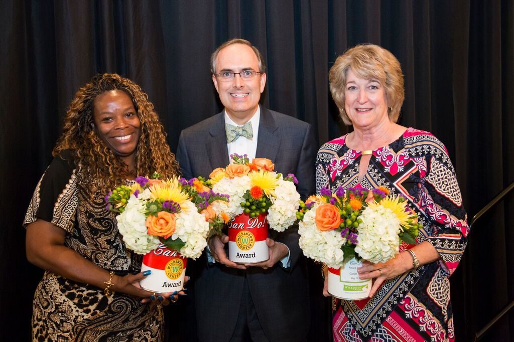 The 2015 recipients of the Can Do!  Awards were Wilkinson Center client Tonya Howard, Communities Foundation of Texas, and Wilkinson Center Shoe Drive Founder, Carlin Morris (right).