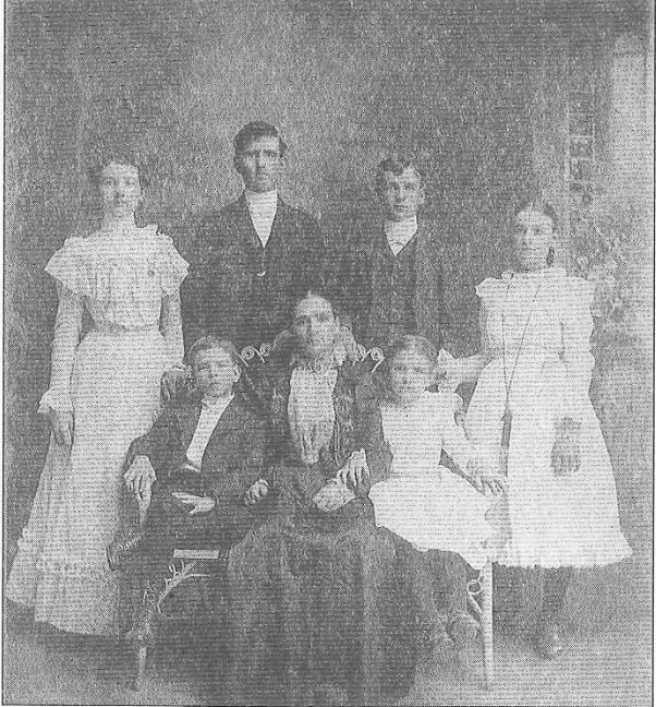 Anna Moser poses with her children (standing from left) Frieda, Charles, Otto and Tillie; (sitting) Ernest and Huldah. The Moser family originally owned dairyland in the neighborhood, which was later converted to residential lots. 