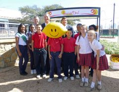 Mayor Rawlings and co-founders Reid Walker and Robert Alpert with participating kids