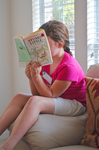 Chloe Kubalak reads “Stuart Little.” Photo by Brittany Nunn
