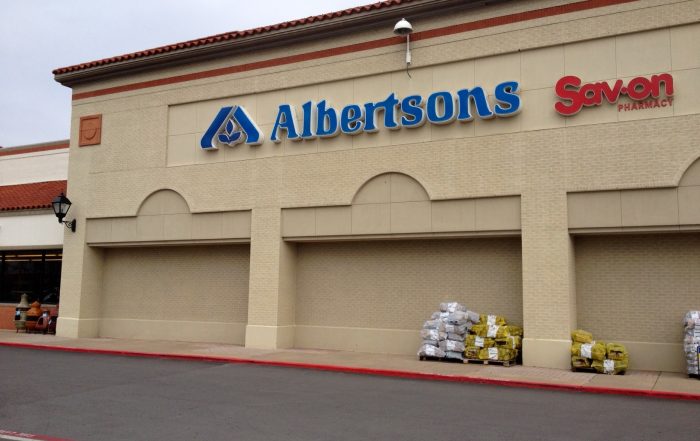 A rectangular building with three large garage doors. The sign above it says "Albertsons."