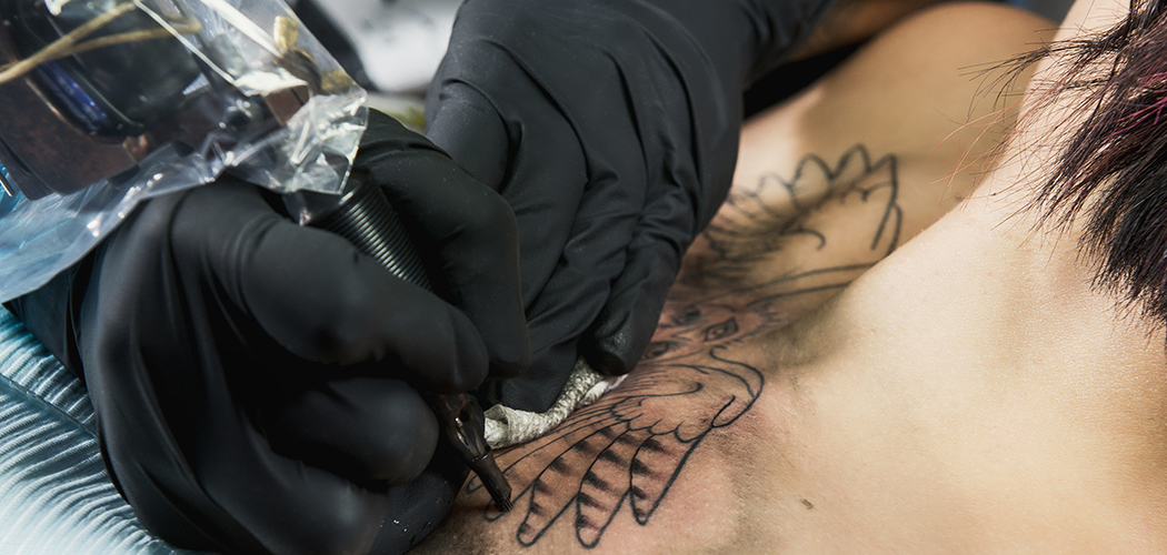 Milan Moore tattoos wings: Photo by Danny Fulgencio 