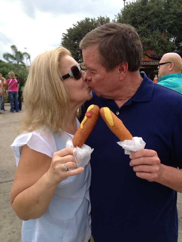 Margaret and Rick Sorrells toast a pair of corndogs every year at the State Fair of Texas