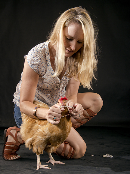 Jessica Allendes and Helga the chicken. (Photo by Danny Fulgencio)