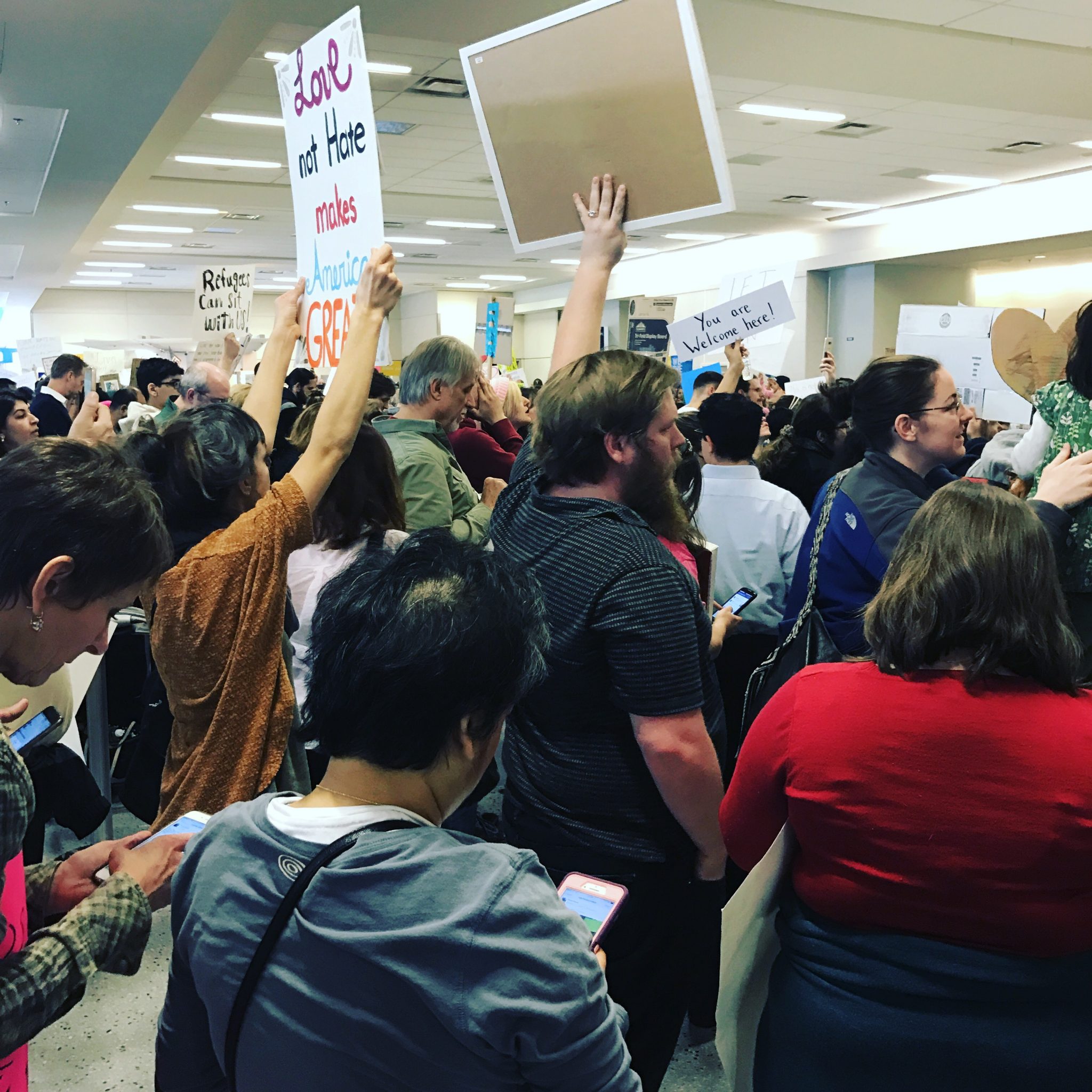 On Sunday, DFW airport was packed with protestors upset about what many are calling a "Muslim ban." (Photo by Michelle Meals)