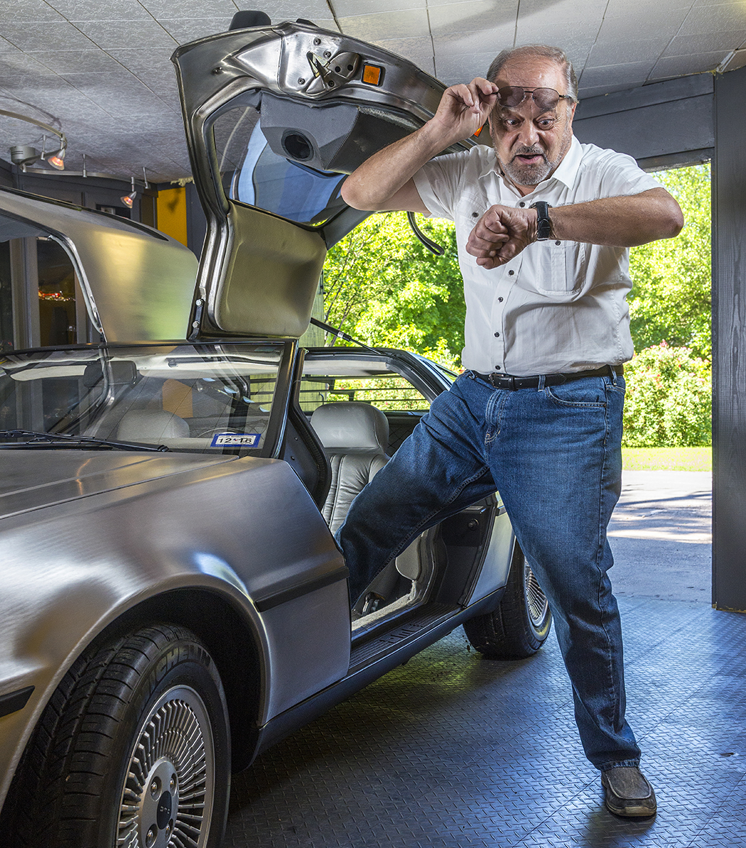 In his best Doc Brown pose, Jaime Sendra steps out of his 1980 DeLorean. (Photo by Danny Fulgencio)