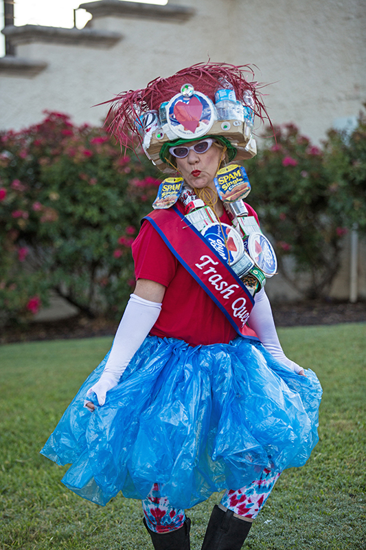 Amy Ewell, one of three Trash Queens, parades in a custom handmade dress as a brand ambassador for FTLOTL at local events. (Photo by Rasy Ran)