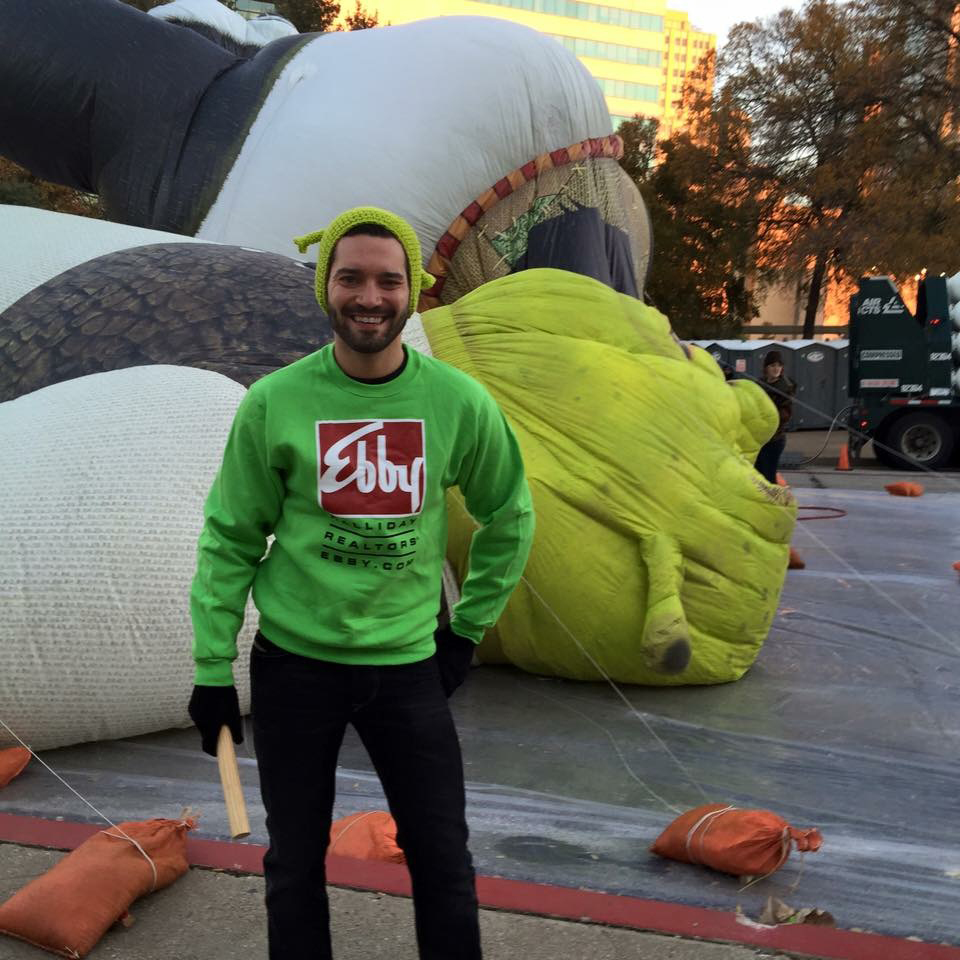 Ryan Booth’s holidays include steering giant inflatables through the streets of Downtown Dallas.