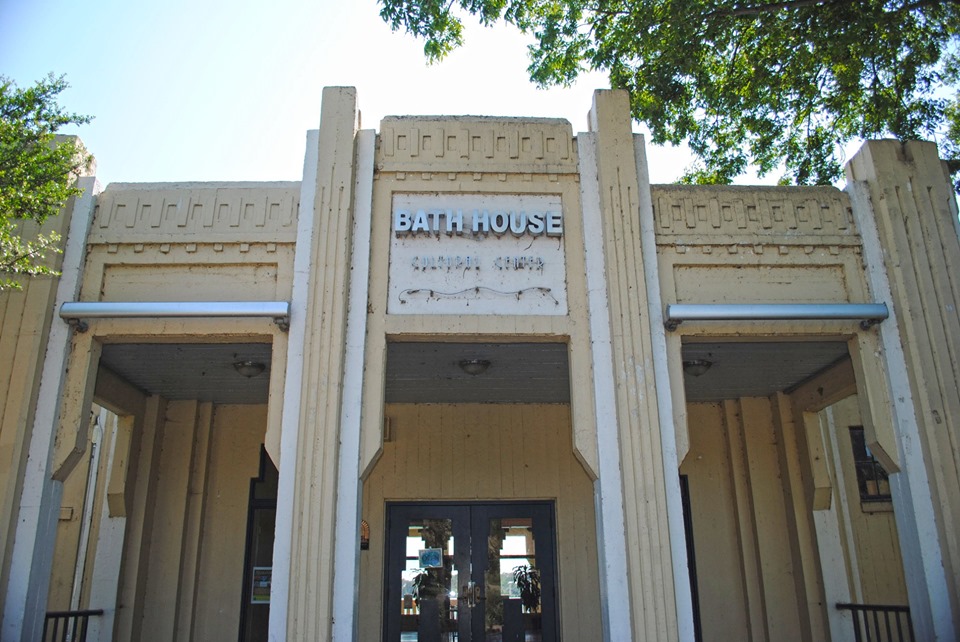An art-deco style building that says "Bath House Cultural Center."