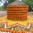 A geometric display of orange, yellow and white pumpkins at the Dallas Arboretum.