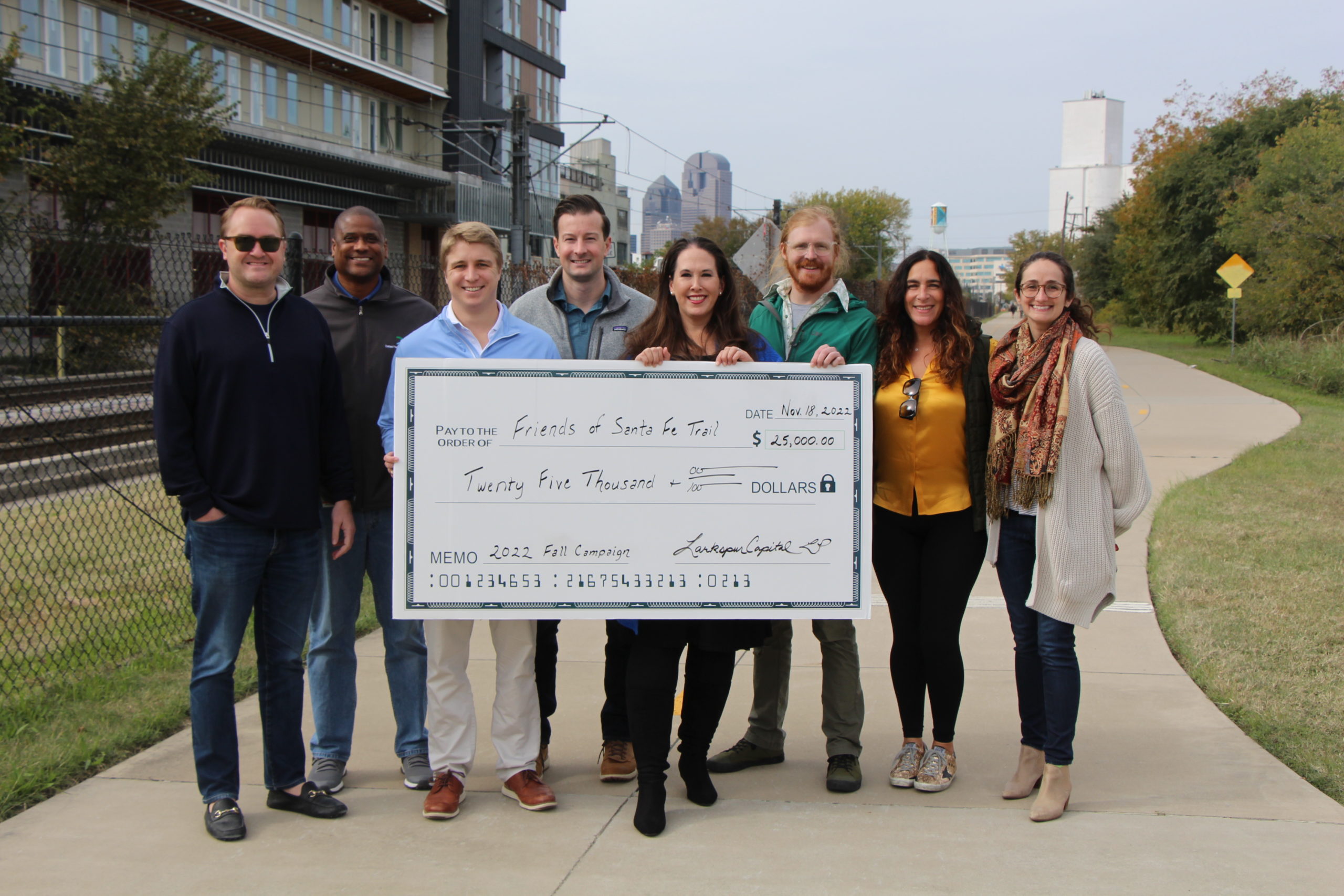 Larkspur Capital presents check to Friends of Santa Fe Trail