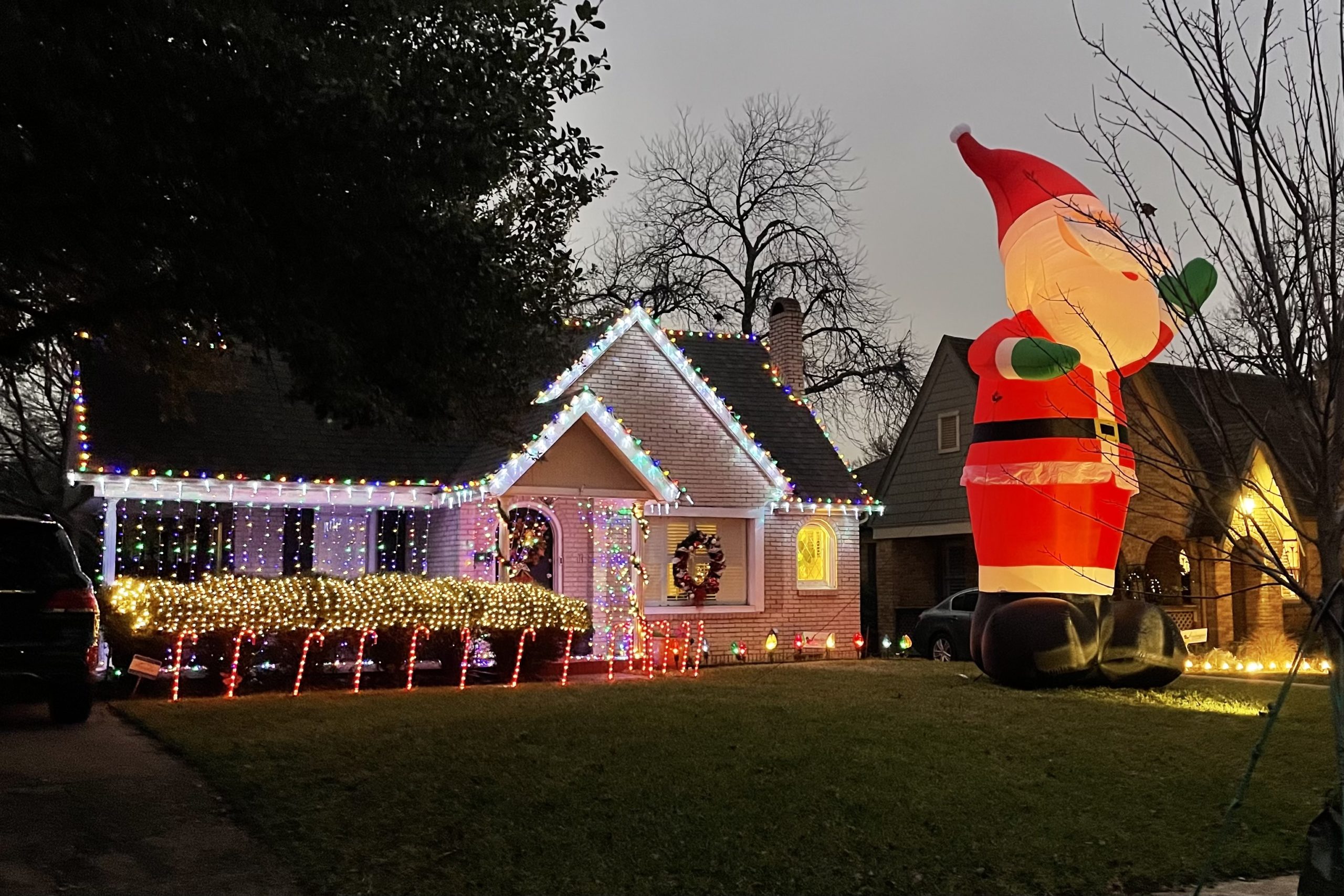 Oversized inflatable Santa in front of M Streets home.