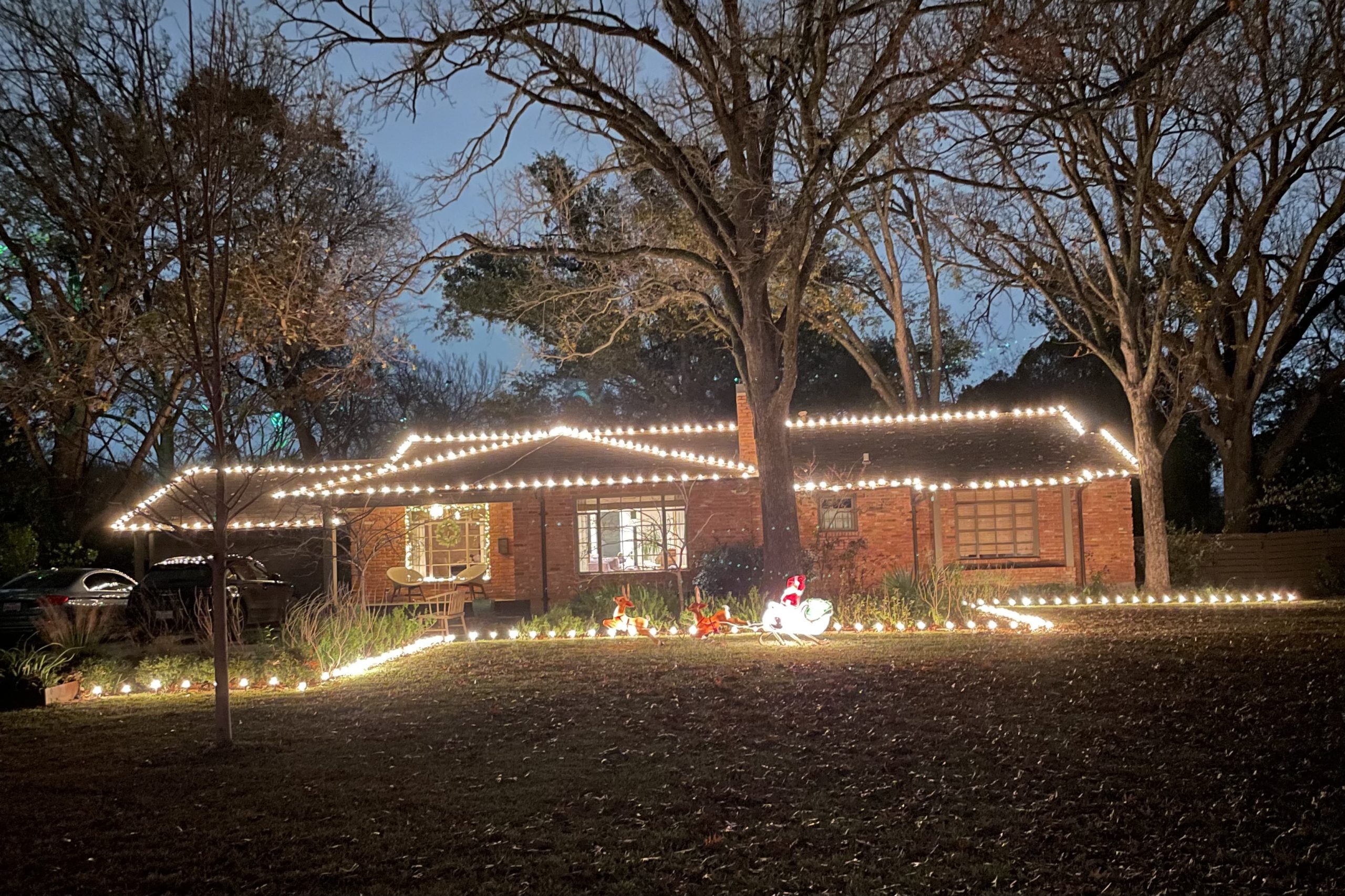 Holiday lights and Santa's sleigh in Casa Linda Estates