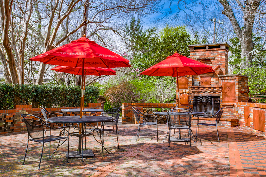 5811_GastonAve Photo from client. Patio with tables with umbrellas