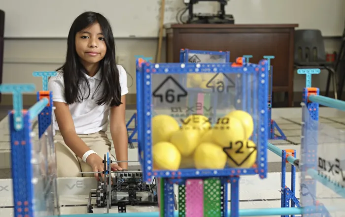Young girl with a robotics project. Photo courtesy of Dallas ISD Hub