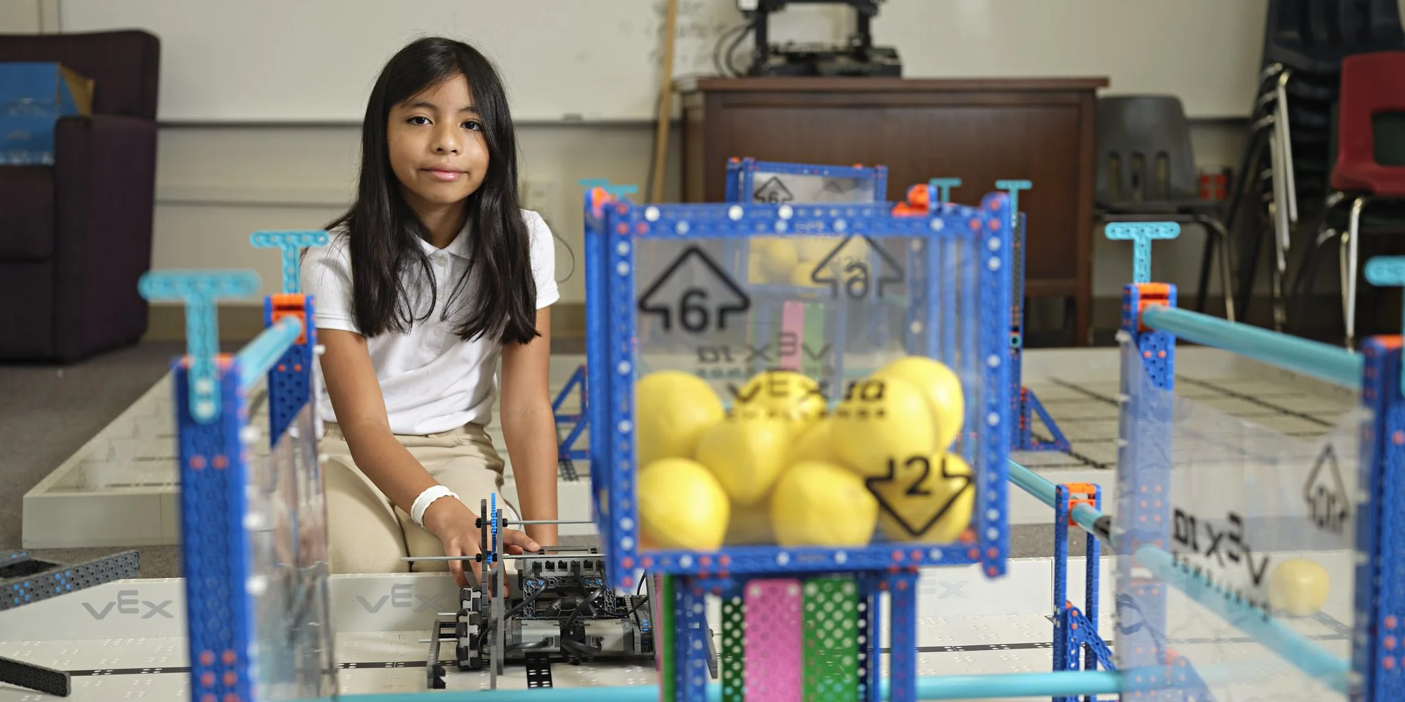 Young girl with a robotics project. Photo courtesy of Dallas ISD Hub