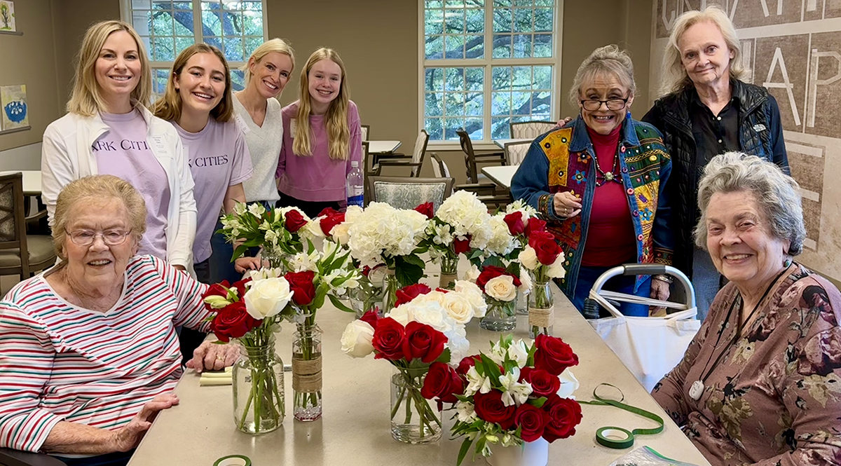 Juliette Fowler residents display the flower arrangments they created. Photo courtesy of Juliette Fowler. 