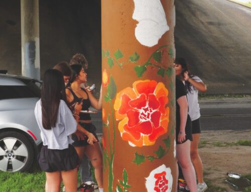 Woodrow Wilson students paint mural on the Santa Fe Trail