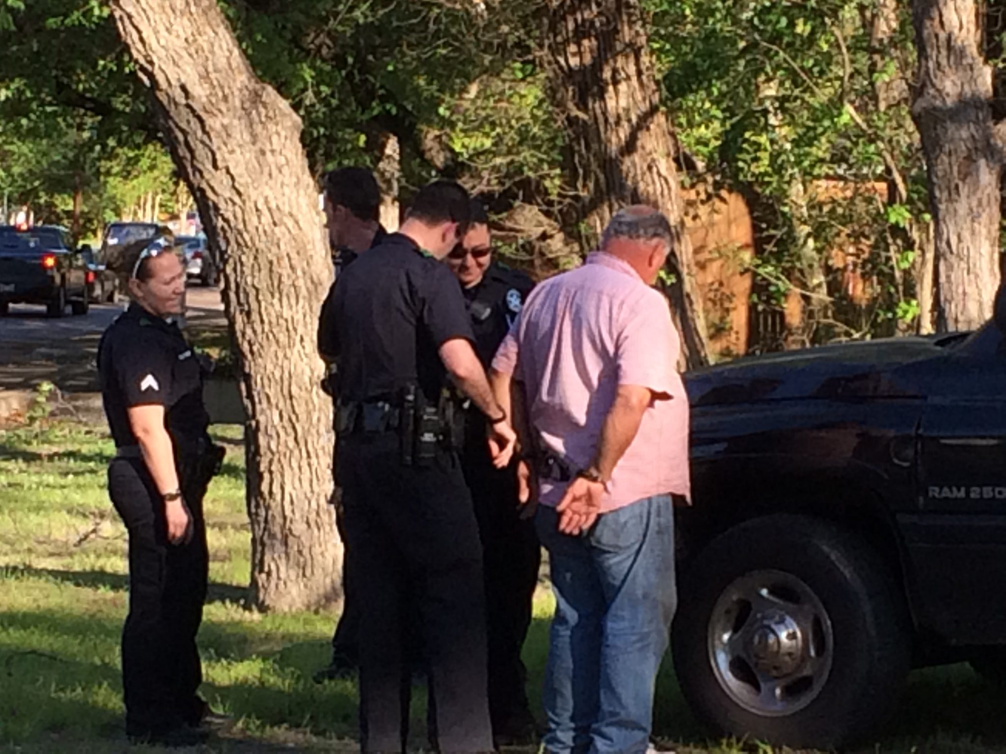 An unidentified man was arrested March 30 for cutting into the pecan 'Indian marker tree' off Peavy Road. (Photo by Amy Martin)